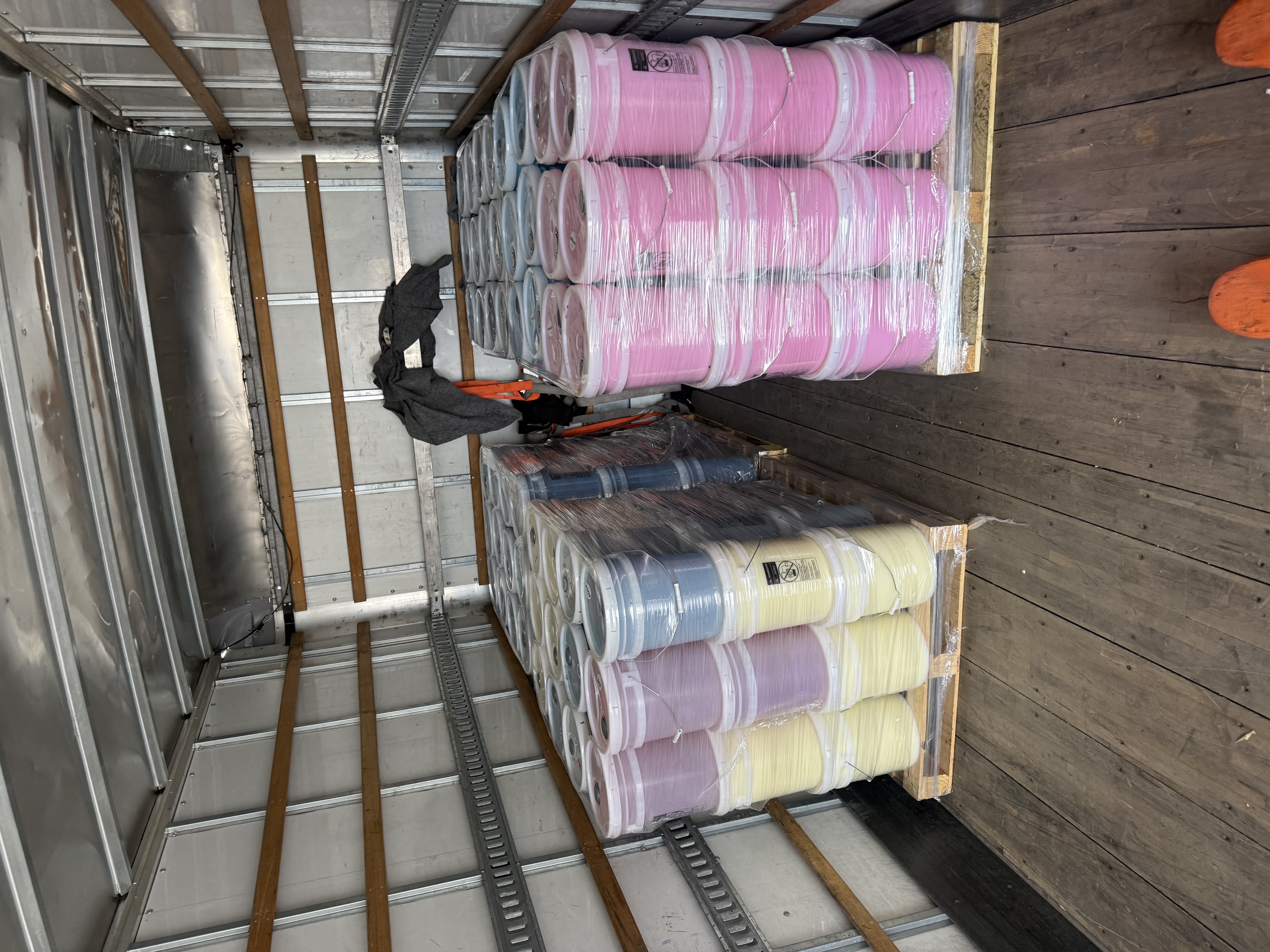 Palletized commercial freight loaded securely in a MaxxLift box truck